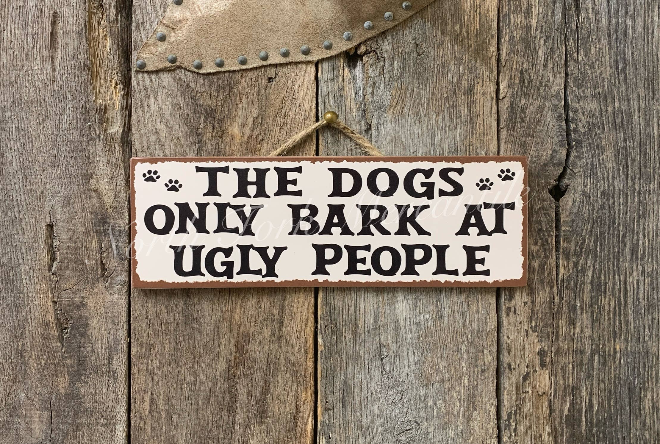 The Dogs Only Bark At Ugly People, Welcome Sign