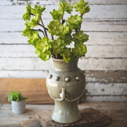 CERAMIC FACE VASE