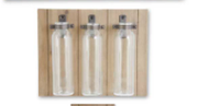 WOOD PLAQUE W/ 3 GLASS BOTTLES